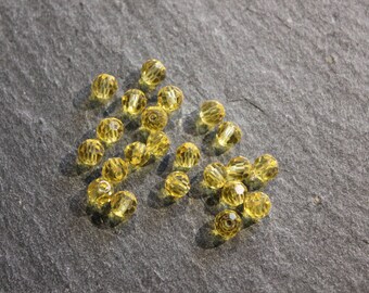 Lot 10 round faceted crystal beads yellow with 4 mm diameter