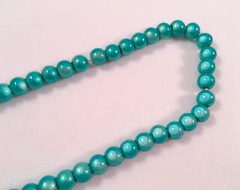 Lot de 10 perles miracle, coloris bleu lagon diamètre 6 mm