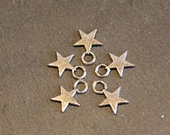 Lot 5 star pendant charms in silver metal