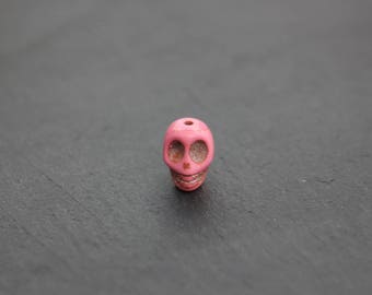 Perle tête de mort en magnésite rose 12x18 mm