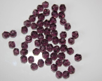 Lot 10 perles toupie bicône en cristal violet diamètre 4 mm