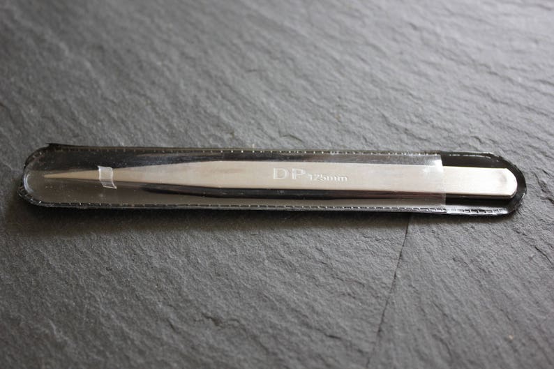 Metal clip to end right called clamp tweezers