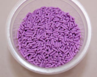 Vermicelles artisanaux couleur lilas en pâte polymère vendus en sachet