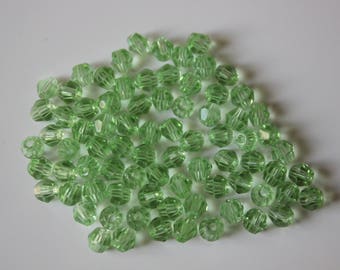 Lot 10 perles toupie bicône en cristal vert clair diamètre 4 mm