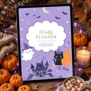 May include: A digital tablet displaying a purple Halloween-themed weekly planner interface. The screen features a white cloud-shaped text box with the words Weekly PLANNER HALLOWEEN EDITION TAP TO BEGIN, surrounded by illustrations of a ghost, cat, and house.