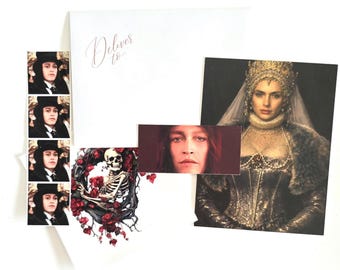 May include: A collection of printed items including a white envelope with the text Deliver to, a vertical strip of four identical portraits of a person in a top hat, a rectangular image of a face, a square image of a person in a crown, and a skeleton with red roses.