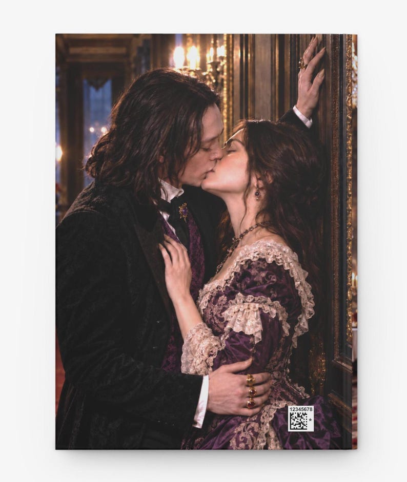 May include: A book cover featuring a couple in historical attire kissing. The person on the left wears a black coat and purple vest, while the person on the right wears a purple dress with lace trim. A small square barcode with the text 12345678 is visible.