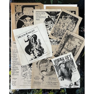 May include: A collection of vintage comic books featuring black and white illustrations. Titles include "Moon Knight," "Jonah Hex," and "Elric." The comics have aged paper and various cover designs.