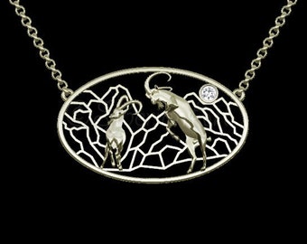 Life on the edge - Nubian Ibex necklace - Solid Gold with white Sapphire