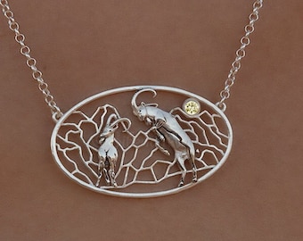 Life on the edge - Nubian Ibex necklace - sterling silver with yellow Sapphire
