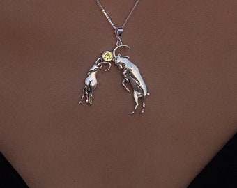 Life on the edge - Nubian Ibex - necklace - sterling silver with a yellow Sapphire