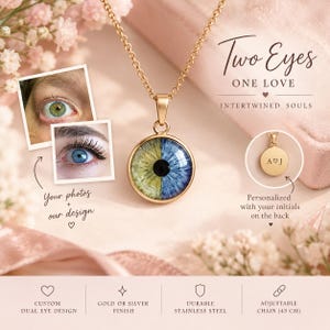 May include: A gold-toned pendant necklace featuring a circular charm with a split-color eye design, one side green and one side blue. The back of the charm is engraved with the initials A and J separated by a heart symbol. The text reads Two Eyes ONE LOVE INTERTWINED SOULS.