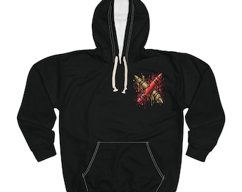 May include: A black hooded sweatshirt featuring a graphic on the left chest of two crossed crayons, one red and one yellow, surrounded by colorful paint splatters. The hoodie includes a drawstring hood with white cords and a front kangaroo pocket.