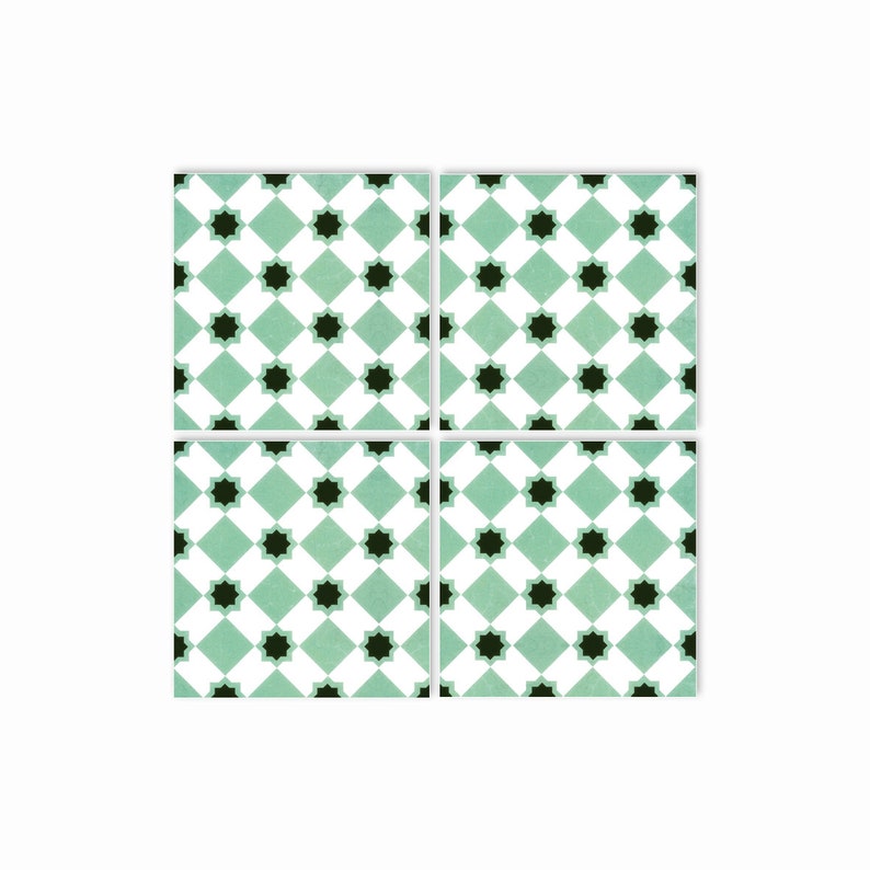 May include: Four square ceramic tiles with a repeating pattern of black stars on a light green background. The stars are set in a diamond pattern.