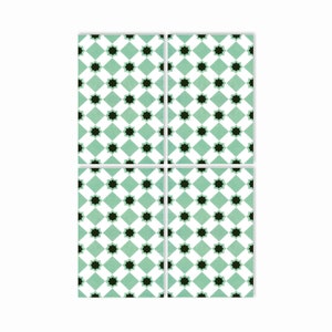 May include: Four square ceramic tiles with a repeating pattern of black eight-pointed stars on a light green and white diamond background.