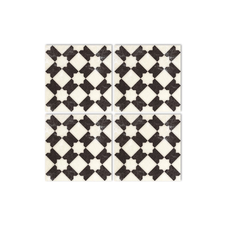 May include: Four black and white patterned square tiles with a geometric design. The tiles have a distressed, vintage look.