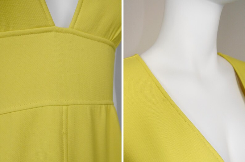 May include: Close-up of a bright yellow dress with a plunging neckline. The dress features a fitted bodice and a defined waistline. The fabric appears to be a textured knit, and the seams are neatly stitched.