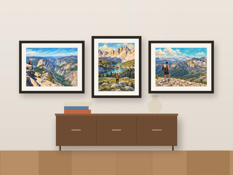 Three hiker prints framed in a row above a wooden sideboard, shown as a room mockup
