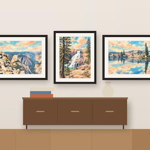 Three colorful Yosemite prints framed in a row above a wooden sideboard, shown as a room mockup