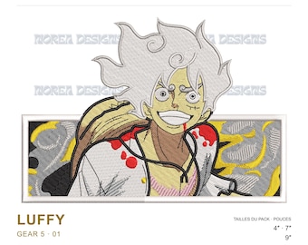 May include: Machine embroidery design of the character Luffy in Gear 5 form, featuring white hair, a wide grin, and a white shirt with red accents. The design is set against a rectangular background with yellow and gray patterns. Text includes LUFFY, GEAR 5, and sizes 4", 7", 9".