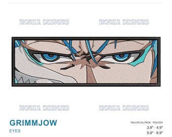 May include: A rectangular machine embroidery design featuring the intense blue eyes of the character Grimmjow from Bleach. The design includes sharp black outlines, light blue hair accents, and tan skin tones, framed by a solid black border.