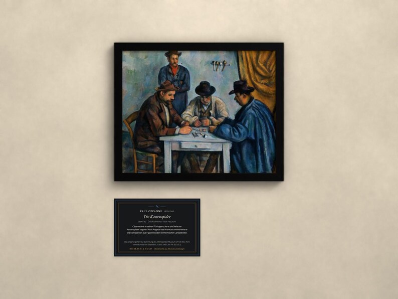 May include: A framed print of Paul C&eacute;zanne's painting The Card Players, depicting three men playing cards at a table with a fourth man standing behind them. Below the frame is a black informational plaque with white text detailing the artwork.
