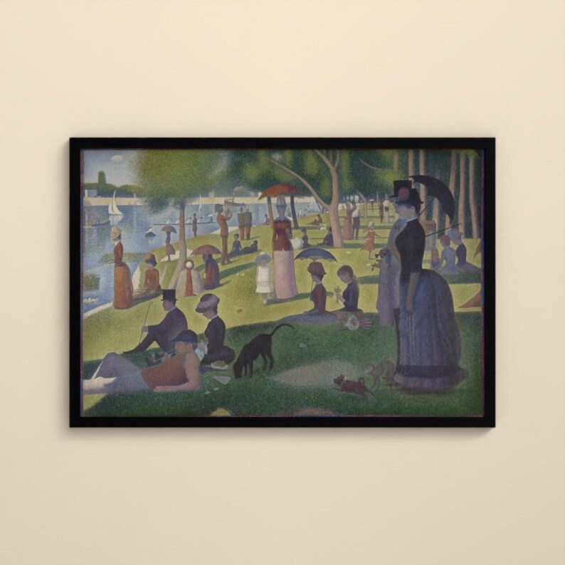 May include: A framed print of a pointillist painting depicting a park scene with numerous figures, trees, and a river in the background. People are shown relaxing on the grass, some with umbrellas, while a black dog stands in the foreground.