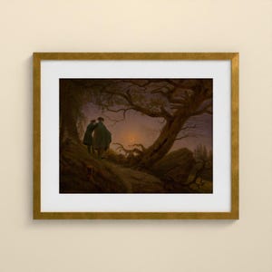 May include: A framed art print featuring a dark, atmospheric landscape painting of two figures standing on a rocky path beneath a large, gnarled tree. The scene is set at twilight with a crescent moon visible in the purple and brown sky.