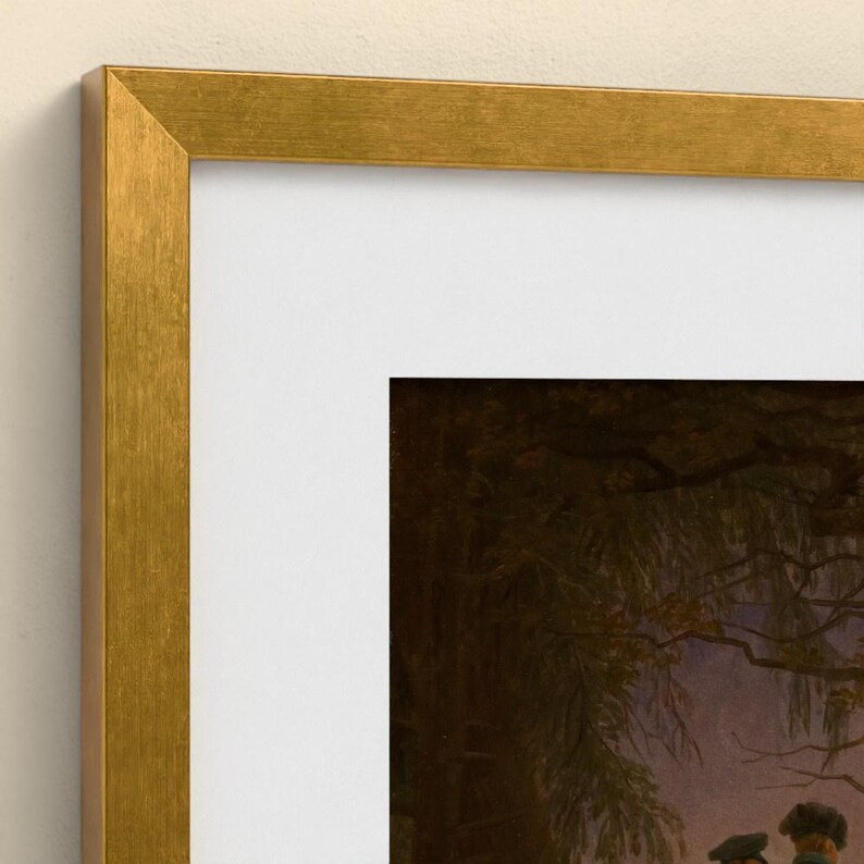 May include: A framed art print featuring a dark, atmospheric landscape painting with trees and figures, enclosed in a metallic gold-toned frame with a wide white mat border that surrounds the central rectangular artwork.