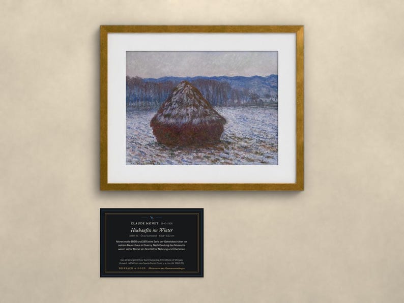 May include: A framed art print of Claude Monet's painting Heuhaufen im Winter, featuring a dark haystack in a snowy field with blue hills in the background. Below the frame is a black informational plaque with white text detailing the artwork.