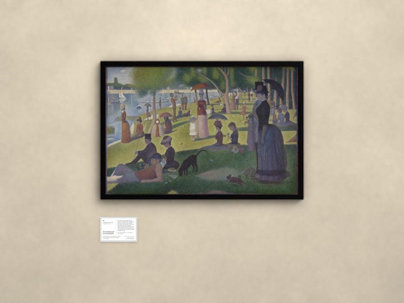 May include: A framed pointillist painting depicting a park scene with numerous figures, a dog, and a monkey on a grassy riverbank. The artwork features a black frame and is accompanied by a small white informational plaque mounted below it.