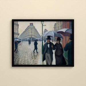 May include: A framed painting depicting a rainy Paris street scene with cobblestones. People in dark coats and top hats walk with large black umbrellas. A couple stands in the foreground, while others walk in the distance near a tall building.