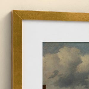 May include: A framed wall art piece featuring a painting of a cloudy sky. The artwork is enclosed in a metallic gold frame with a wide white mat border, showcasing a detailed landscape scene with soft blue and grey tones in the clouds.