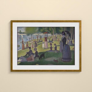 Puede incluir: Una impresi&oacute;n enmarcada de una pintura puntillista que muestra una escena de parque con numerosas figuras, incluyendo personas con ropa de &eacute;poca, un perro negro y una persona con un paraguas negro, junto a un r&iacute;o.
