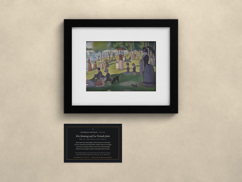 May include: A framed print of Georges Seurat's painting A Sunday on La Grande Jatte, featuring people in a park by the water. Below the frame is a black informational card with white text detailing the artwork, artist, and historical context.