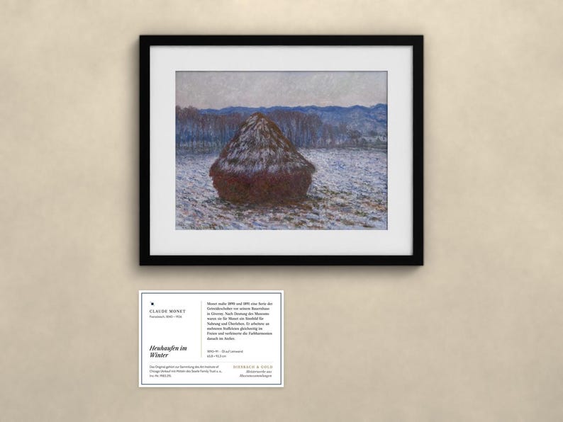 May include: A framed print of Claude Monet's painting titled Heuhaufen im Winter, depicting a dark haystack in a snowy field with blue-toned trees in the background. Below the frame is an informational card with text about the artwork.