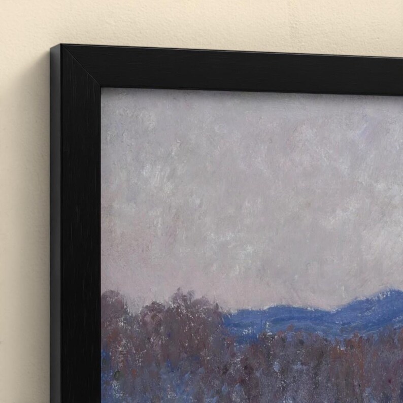 May include: A framed landscape painting featuring a muted gray sky above a horizon of dark blue mountains and textured, brownish-purple trees. The artwork is enclosed in a simple, solid black rectangular frame with clean, sharp edges.