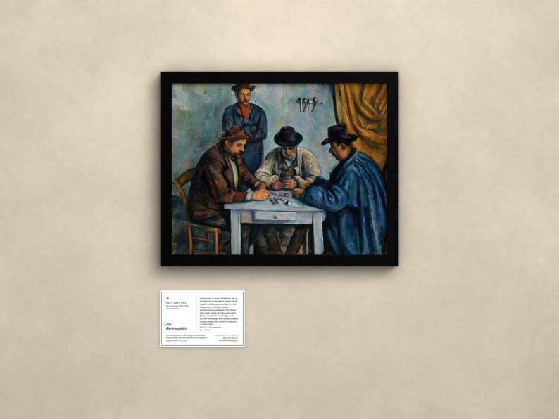 May include: A framed print of Paul C&eacute;zanne's The Card Players, depicting three men seated at a white table playing cards, with a fourth man standing behind them. The artwork features muted tones of blue, brown, and tan within a black frame.