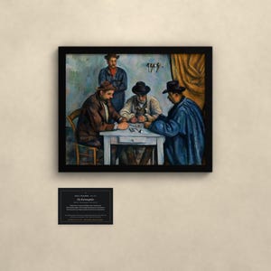 May include: A framed print of Paul C&eacute;zanne's painting The Card Players, depicting four men around a table. Below the frame is a black plaque with white text reading Paul C&eacute;zanne, 1890-1892, Die Kartenspieler, and descriptive information.