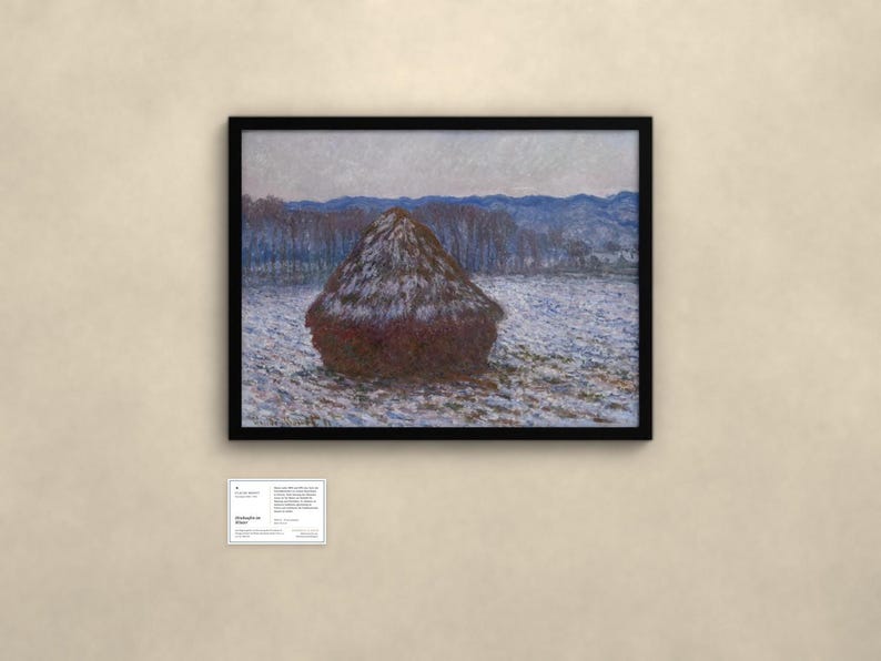 May include: A framed landscape painting featuring a large, dark haystack centered in a snowy field under a pale sky, with blue-toned hills in the distance. Below the artwork, a small white informational placard displays text.