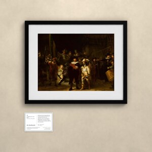 May include: A framed art print of Rembrandt's The Night Watch, featuring a group of figures in dark, dramatic lighting with golden highlights. Below the frame is a small white informational card with black text titled Die Nachtwache.