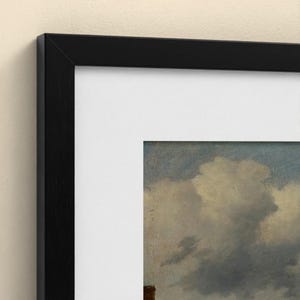 May include: A framed wall art piece featuring a painting of a cloudy sky with shades of blue and grey. The artwork is enclosed in a simple black frame with a wide white mat border, creating a clean and defined presentation for the print.