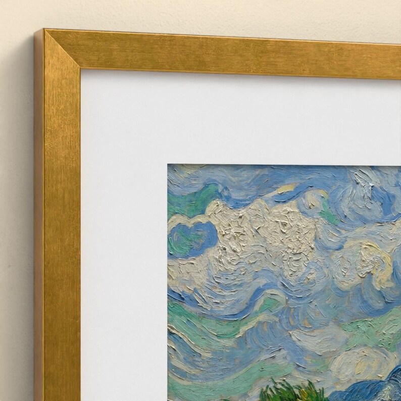May include: A framed art print featuring a textured oil painting of a swirling blue and white sky with visible brushstrokes. The artwork is encased in a metallic gold frame with a wide white mat border, creating a clean and polished presentation.