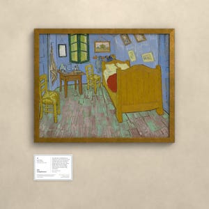 May include: A framed painting of a bedroom with blue walls, a yellow wooden bed, two yellow chairs, and a small wooden table. The floor is light brown with green accents. Several small framed pictures hang on the wall near a green window.