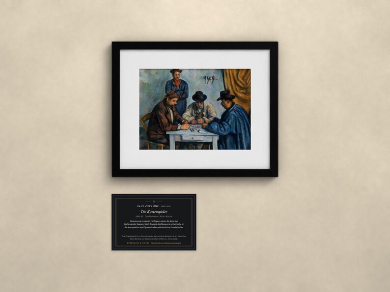 May include: A framed art print of Paul C&eacute;zanne's The Card Players, depicting three men in hats playing cards at a table, with a standing figure behind them. Below the frame is a black informational plaque with white text detailing the artwork.