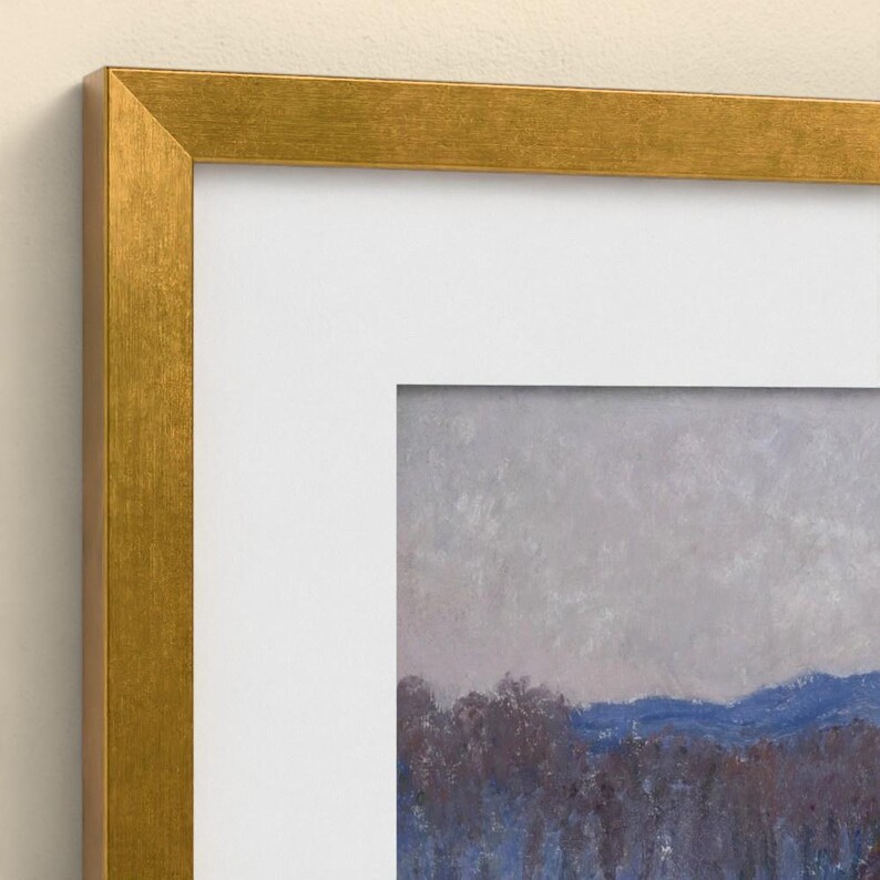 May include: A framed landscape painting featuring a textured gray sky above a line of dark blue and purple trees, set within a wide white mat and a metallic gold frame. The artwork displays visible brushstrokes and a muted color palette.