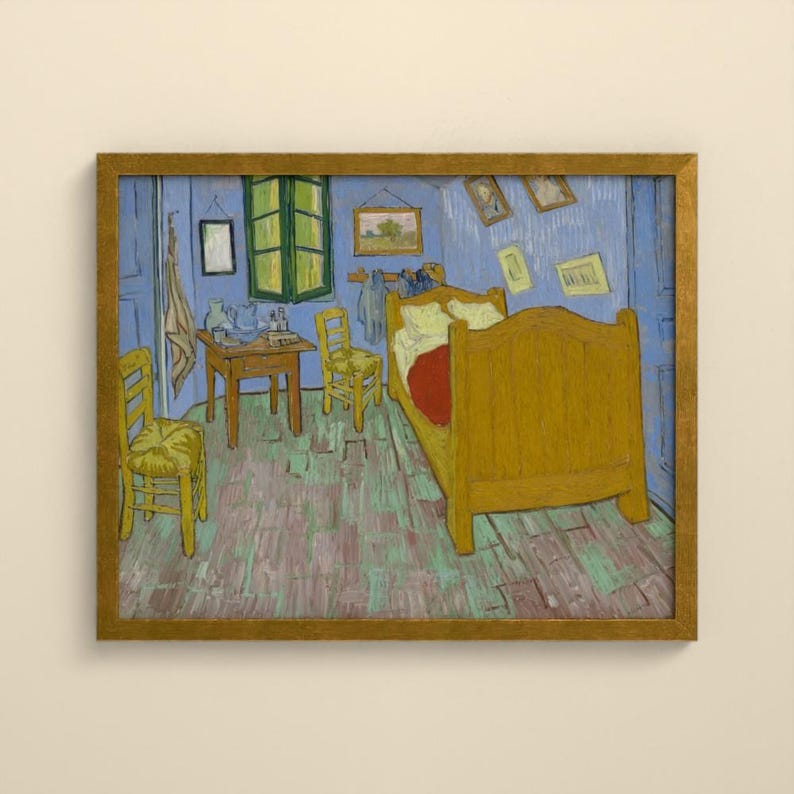 May include: A framed print of a painting depicting a bedroom with a large yellow wooden bed, two yellow chairs, a wooden table, and blue walls. Several small framed pictures hang on the walls, and a cloth hangs near a green window frame.