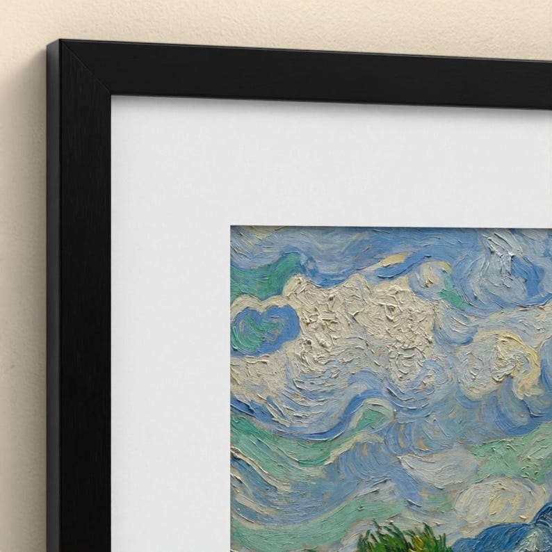 May include: A framed art print featuring a textured oil painting of a swirling sky with thick, visible brushstrokes in shades of blue, white, and light green. The artwork is encased in a simple black frame with a wide white mat border.