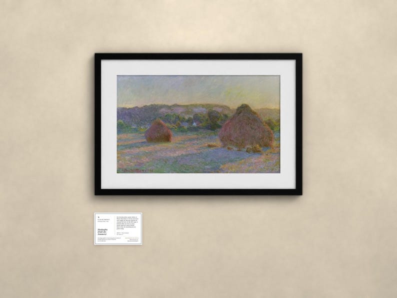 May include: A framed landscape painting depicting two haystacks in a field under a soft sky, with visible brushstrokes in shades of yellow, purple, and green. Below the frame is a small white informational card with printed text.