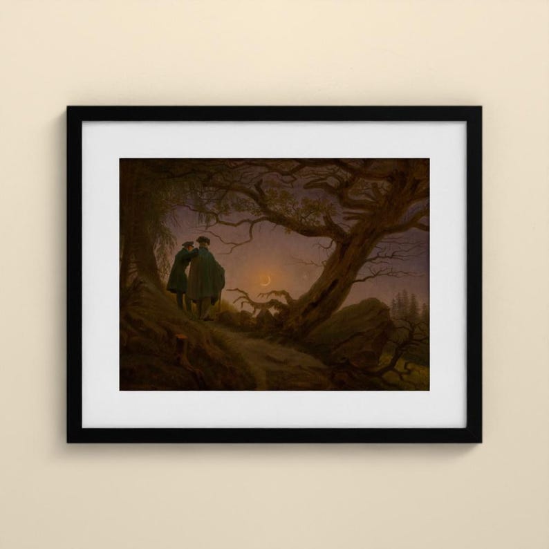 May include: A framed art print depicting two figures standing on a dark, hilly landscape under a twilight sky. A large, gnarled tree with bare branches frames the scene, while a thin crescent moon glows faintly in the distance.